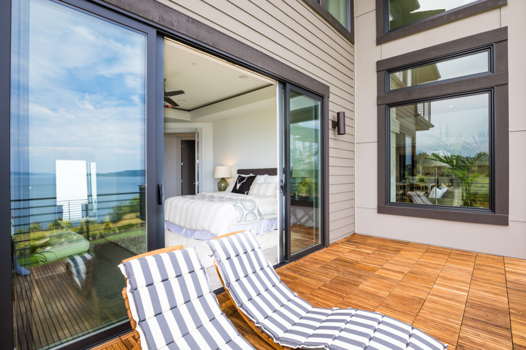 Luxury double sliding doors to balcony from master bedroom