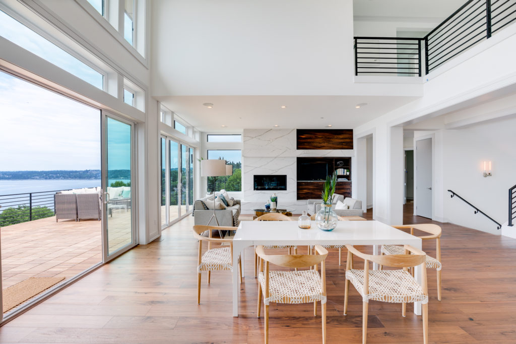 Luxury dining room with view of balcony and living room