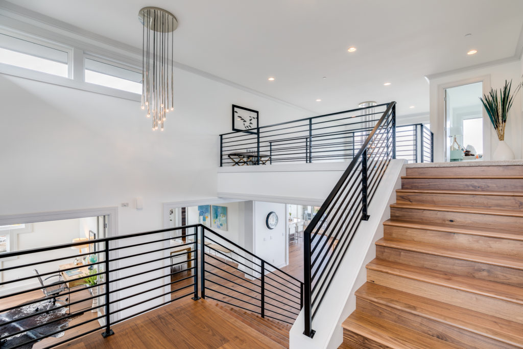 Luxury staircase to upstairs with balcony inside of living area