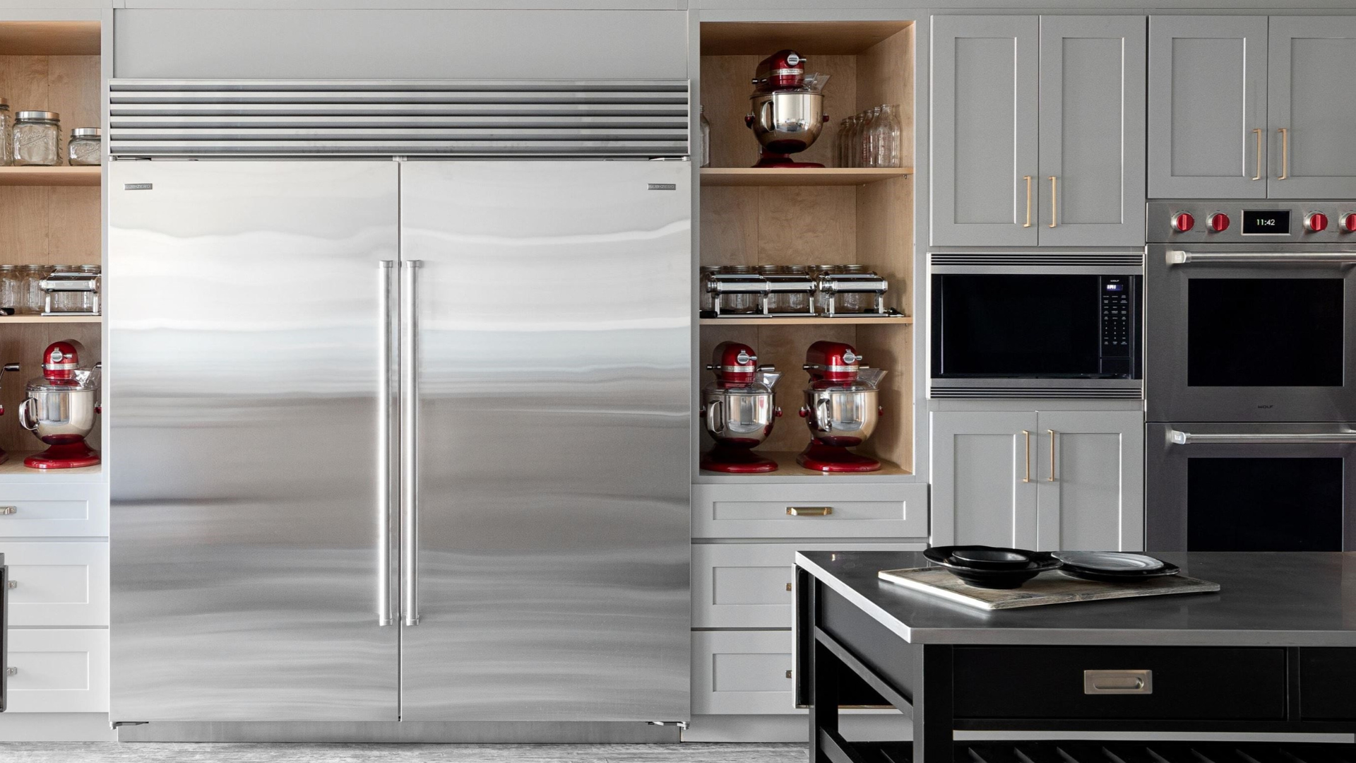 Kitchen with Sub-Zero refrigerator and Wolf oven appliances